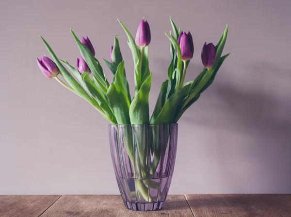 stock image Vase with purple tulips