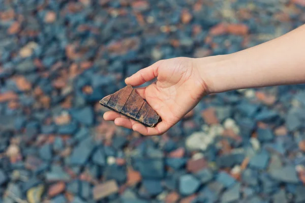 Woman holding a piece of slate — Stock Photo, Image