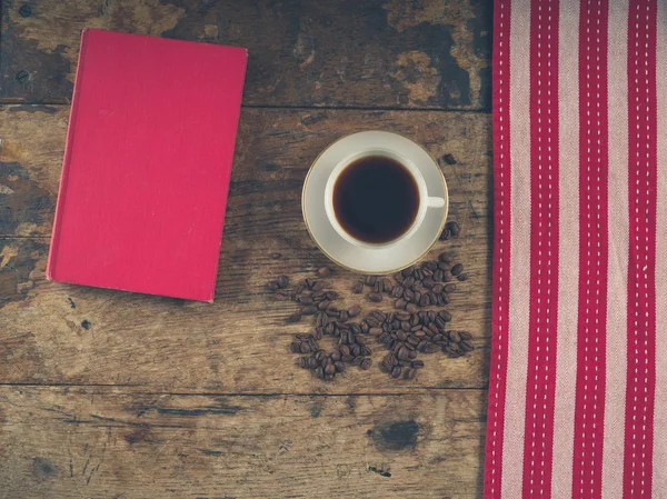 Concepto de café con taza y libro — Foto de Stock