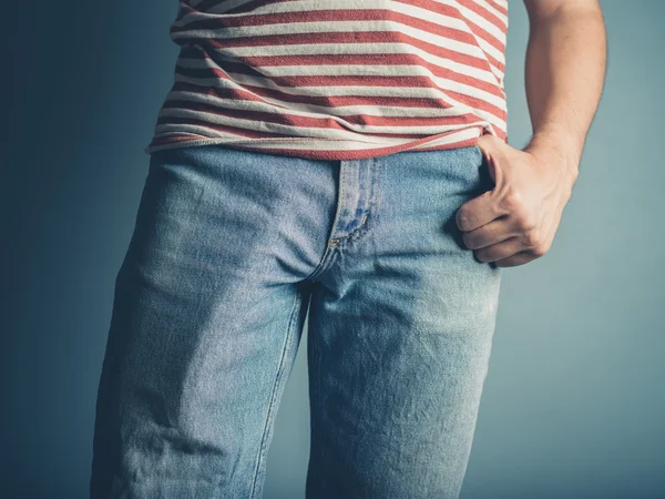 Sexy young man with hand in his pocket — Stock Photo, Image