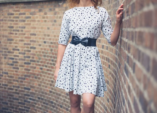 Young woman on stairs outside — Stock Photo, Image