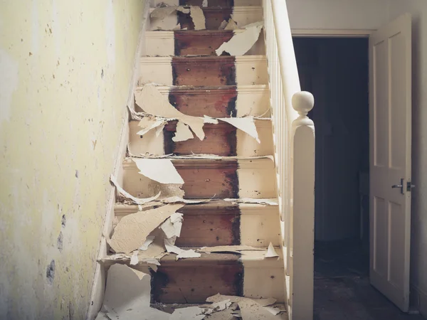 Staircase with pieces of wallpaper — Stock Photo, Image
