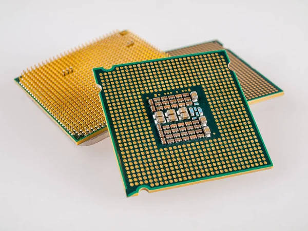 several different types of microprocessors for a computer, close-up, the choice of a silicon chip for installation in a working or gaming computer, multithreading and multi-core CPU, central processing unit, manufacturing process, installation socket