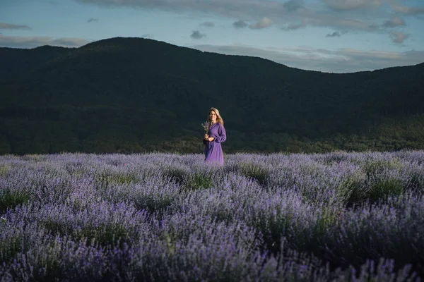 woman in purple dress on lavender field