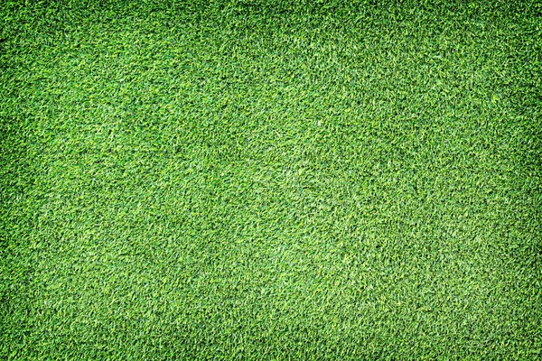 背景に緑の人工芝のテクスチャ. — ストック写真