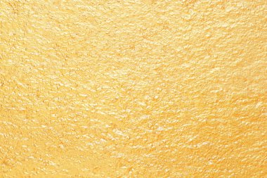 Altın duvar arka plan veya doku ve gölge