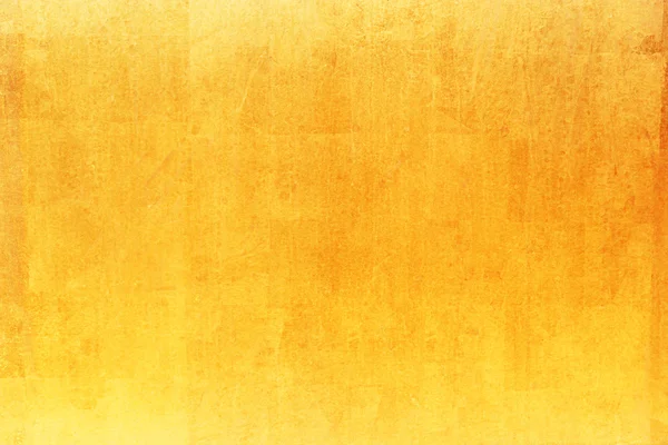 Gold bakgrund eller textur och skugga, gamla väggen metall. — Stockfoto