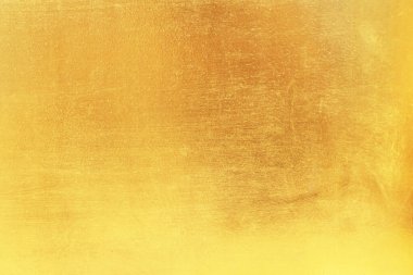 Altın soyut arkaplan veya doku ve gradyan gölgesi.