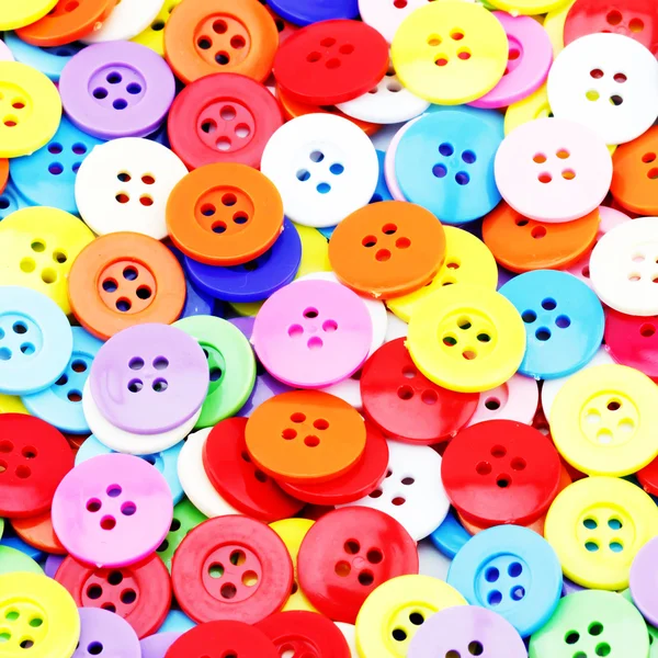 Färgglada knappar, färgglada clasper isolera på vit bakgrund — Stockfoto