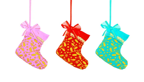 Christmas sock hanging over white background, pink red and blue — Stock Photo, Image