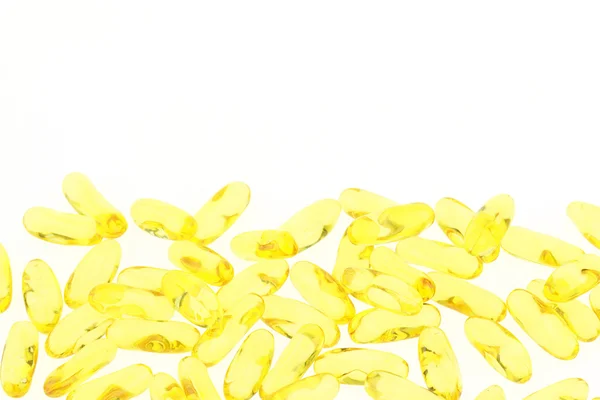 Fish oil capsules on white background. — Stock Photo, Image