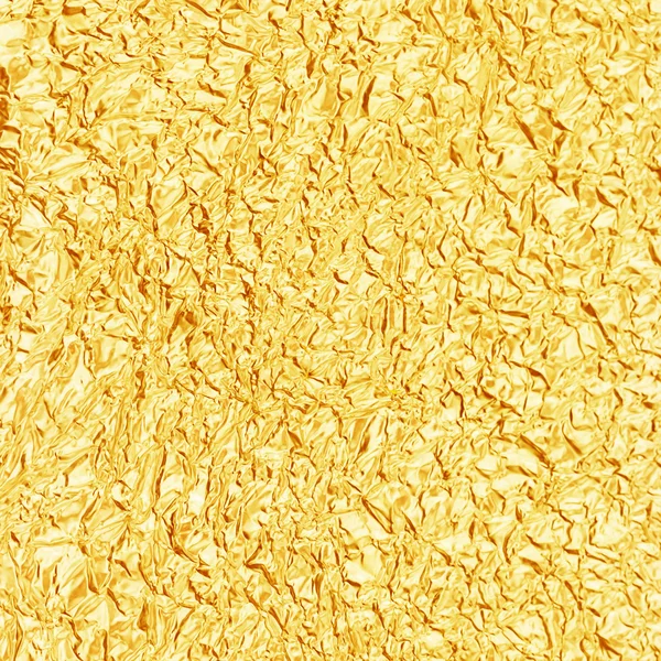 Shiny yellow leaf gold foil texture for background — Stock Photo, Image