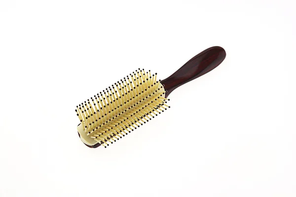 Escova de cabelo isolado no fundo branco — Fotografia de Stock