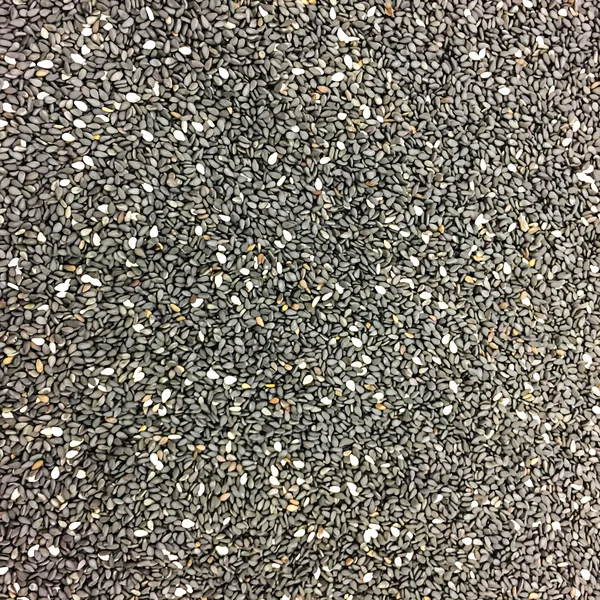 A lot of black sesame for background uses — Stock Photo, Image