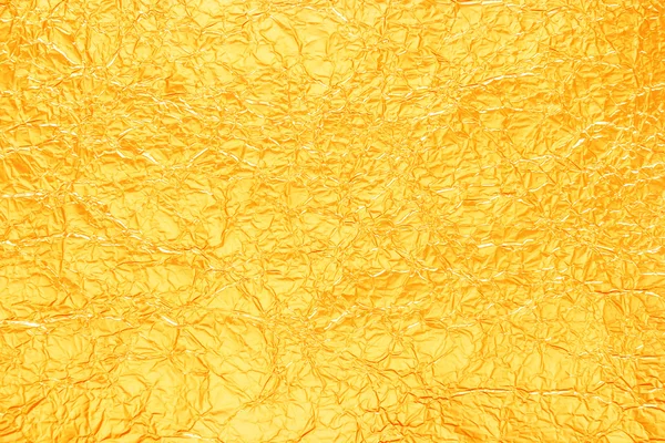 Shiny yellow leaf gold foil texture for background — Stock Photo, Image