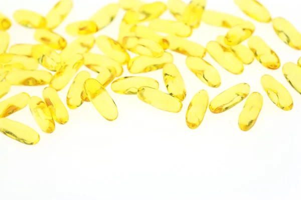 Fish oil capsules on white background. — Stock Photo, Image