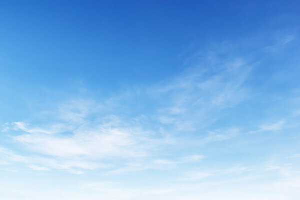 Fantastic soft white clouds against blue sky background