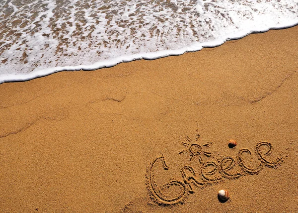 Griekenland teken op het strand — Stockfoto