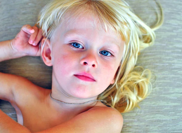 Little boy with a long blonde hair — Stock Photo, Image