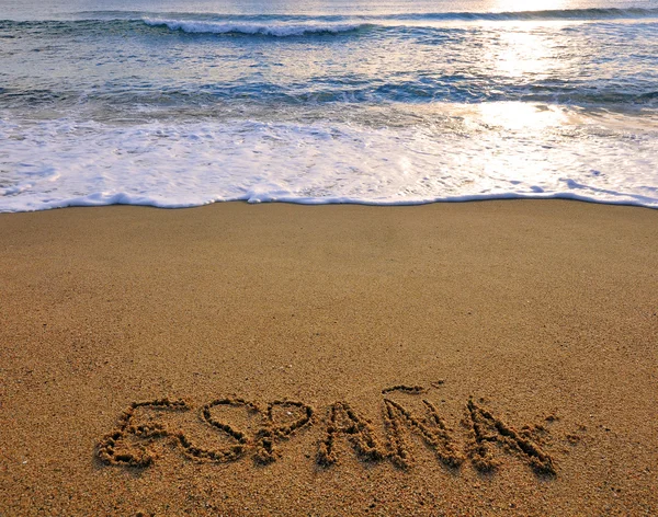 Hiszpania znak na plaży — Zdjęcie stockowe