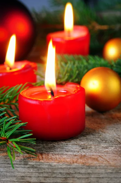 Burning red candles — Stock Photo, Image