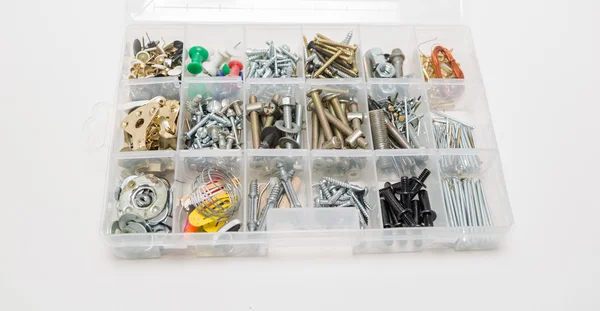 Detailed view of  plastic organizer box with various screws nuts bolts and other home care necessities — Stock Photo, Image