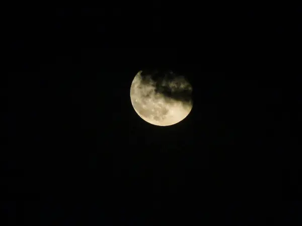 Moon partially closed cloud — Stock Photo, Image