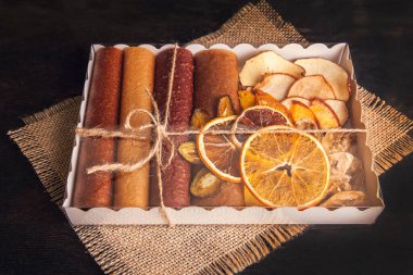 Sweet fruit snacks in a package - pastilles and dried fruit. Fruit candy, Sugar Free, healthy nutrition