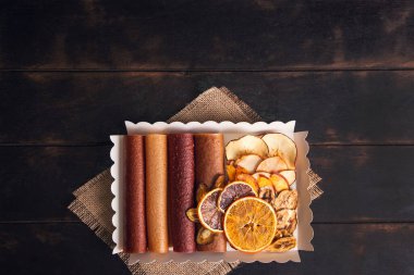 Sweet fruit snacks in a package - pastilles and dried fruit. Fruit candy, Sugar Free, healthy nutrition