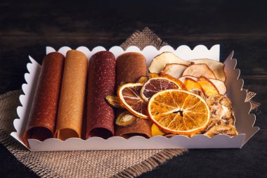 Sweet fruit snacks in a package - pastilles and dried fruit. Fruit candy, Sugar Free, healthy nutrition