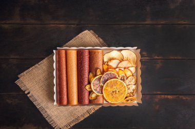 Sweet fruit snacks in a package - pastilles and dried fruit. Fruit candy, Sugar Free, healthy nutrition