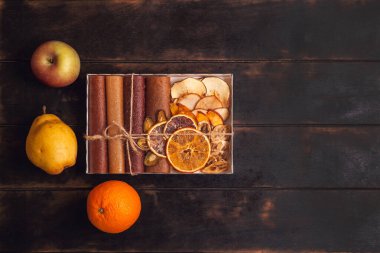 Gift with healthy sweets. Sweet fruit snacks in a package - pastilles and dried fruit. Fruit candy, Sugar Free, healthy nutrition.