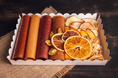 Sweet fruit snacks in a package - pastilles and dried fruit. Fruit candy, Sugar Free, healthy nutrition