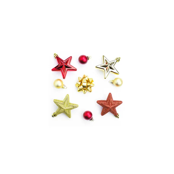 Christmas tree toys, red and gold stars, balls on a white background. — Stock Photo, Image