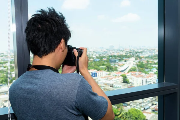 Rear View Male Holding Camera Window Take Photo View Attention — Stock Photo, Image