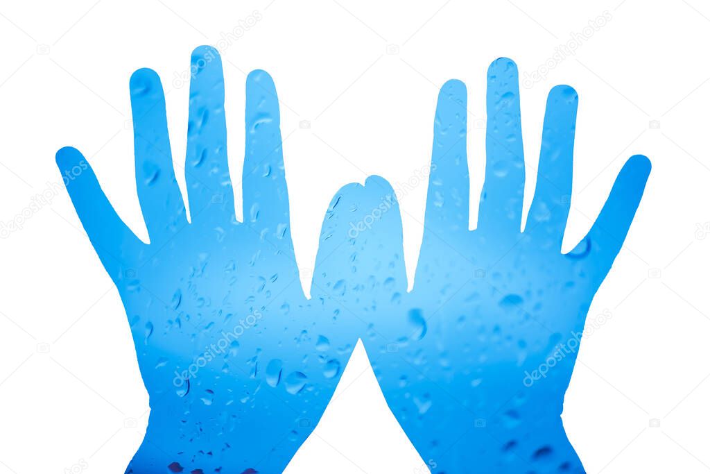 water drops on the glass on the hands on a white background.