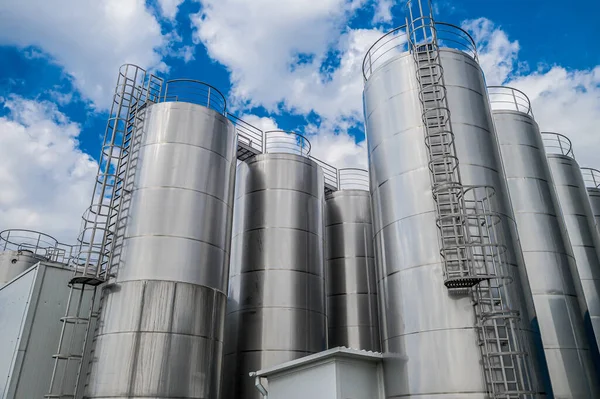 stainless steel tanks at a food processing plant top view.