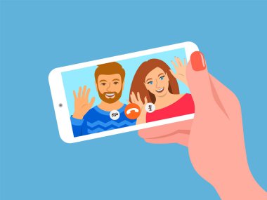 Akıllı telefondan çevrimiçi video görüşmesi. Genç çift, kadın ve erkek, mobil sosyal medya uygulamasındaki arkadaşlarına merhaba diyor. Çizgi film çizimi. Koronavirüs kilitlenirken sosyal uzaklık.