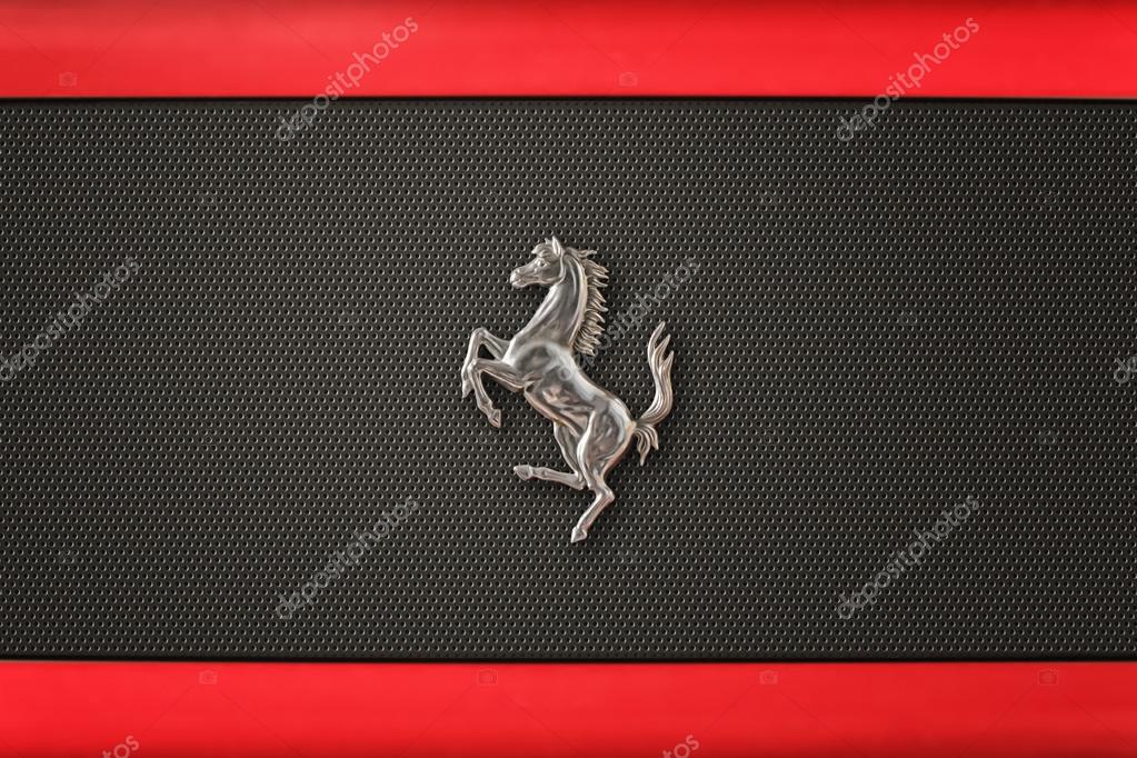 CASERTA, ITALY - AUGUST 06, 2013: Logo of a Ferrari car during Ferrari Meeting Show Days in Caserta Street City. The Scuderia Ferrari team was founded by Enzo Ferrari in 1929.