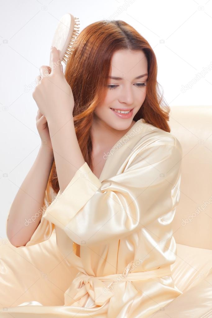 beautiful girl in a beige smock