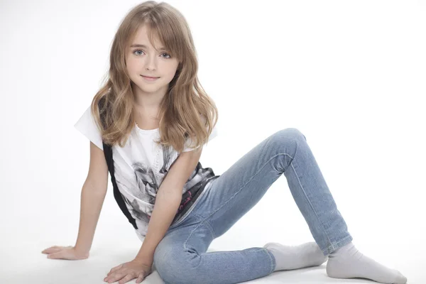 Portrait of a beautiful girl in  t-shirt and trousers — Stock Photo, Image