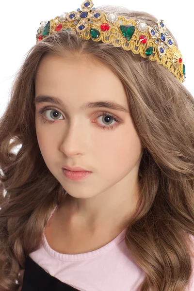 Portrait of a young girl with long hair in the crown — Stock Photo, Image