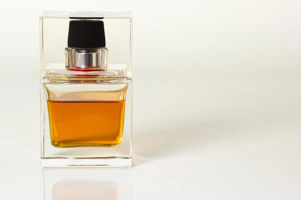 Beautiful is square with womens perfume bottle — Stock Photo, Image