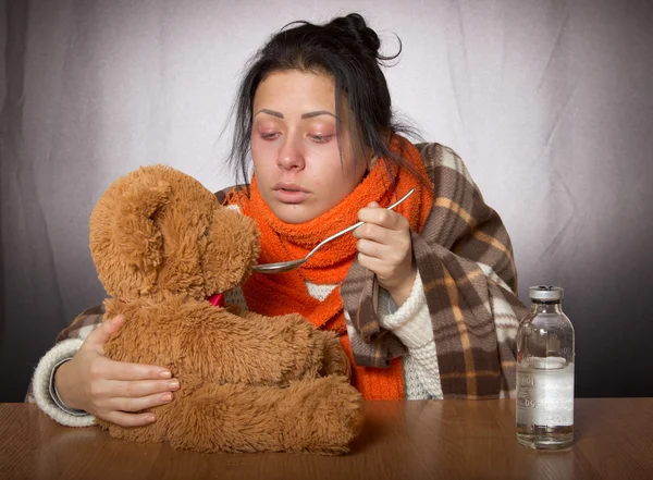 Tıp ayı grip karşı bir kadın