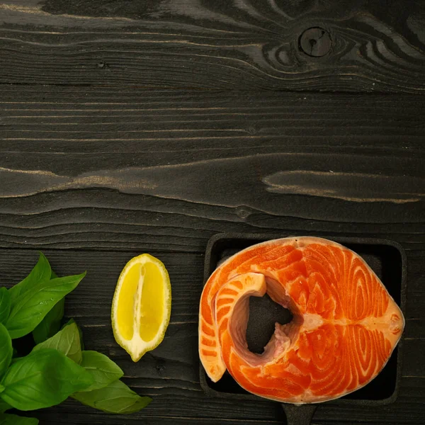 Salmon Steak Slices Lemon Basil Oil Wooden Surface Kitchen Table — Stock Photo, Image