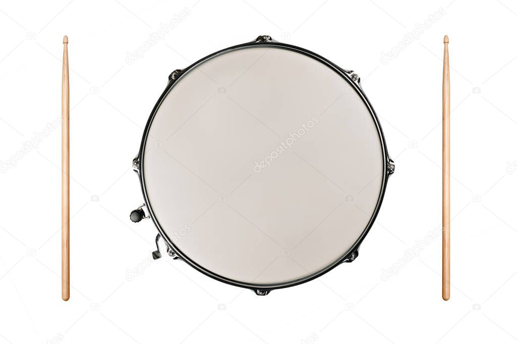 top view of a snaredrum and two drumsticks on white background