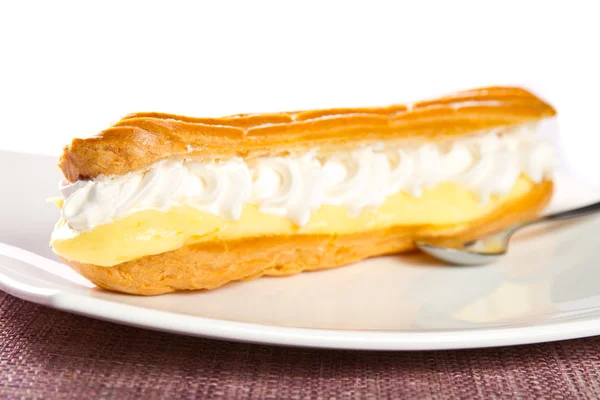 Cake with vanilla cream — Stock Photo, Image
