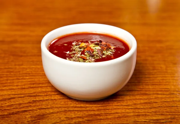 Hot sauce in a bowl — Stock Photo, Image