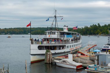 MS Mount Washington cruise ship docked at Weirs Beach port on Lake Winnipesaukee in City of Laconia, New Hampshire, USA. clipart
