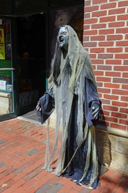 Ghost figure in historic town Salem, Massachusetts, USA. Salem is famous for witch and ghost culture in history. clipart
